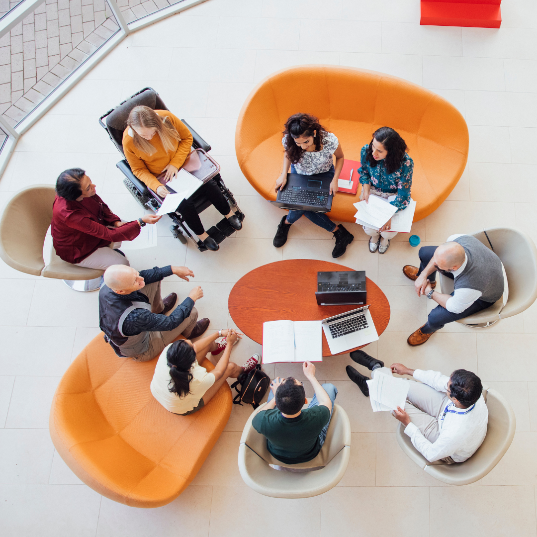 A group of students sat in a circle having a discussion