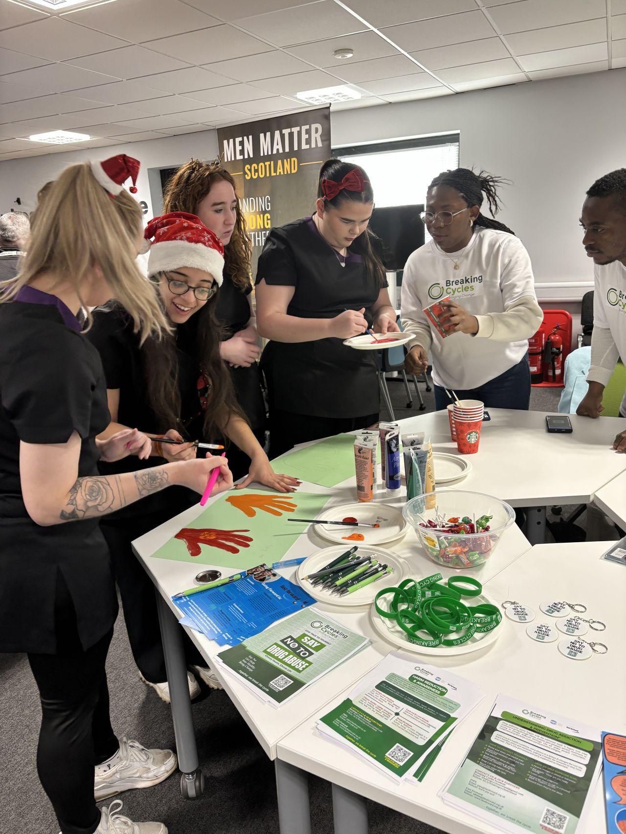 Photo of students participating in a Break the Cycle activity
